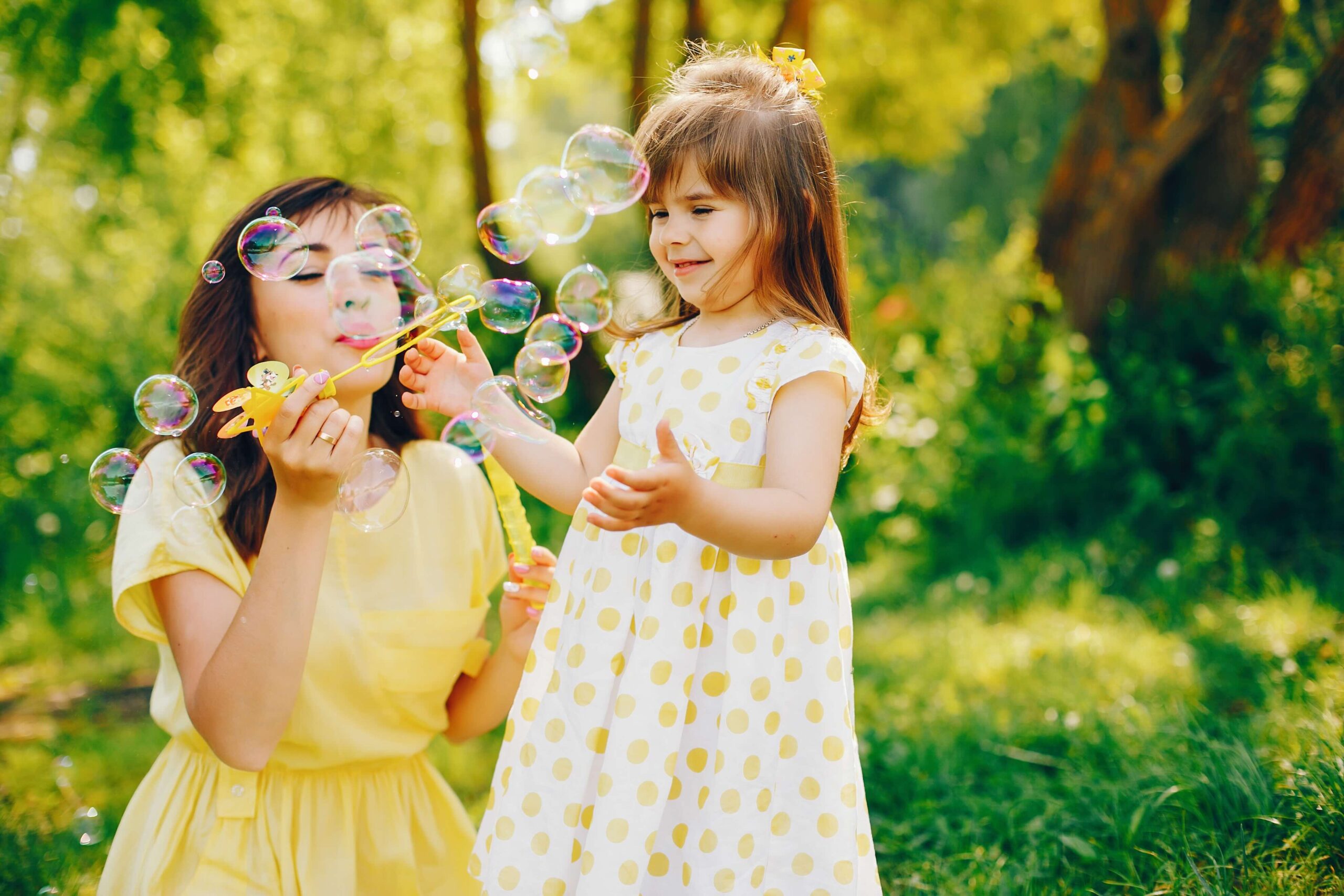mother with daughter in a solar park
